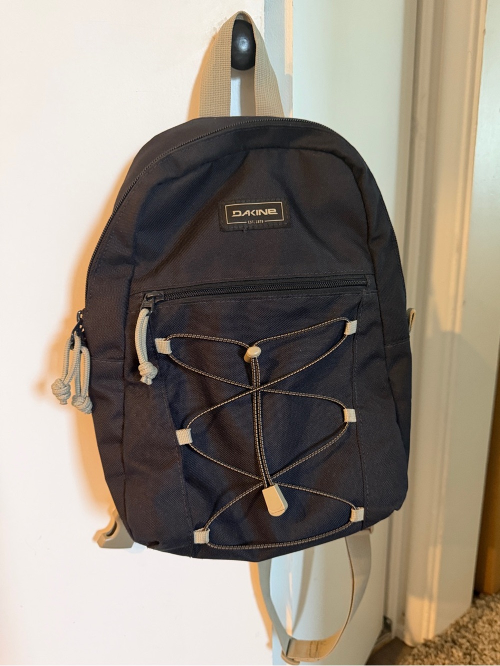 Dakine Black Sling Backpack with Contrasting Tan Accents